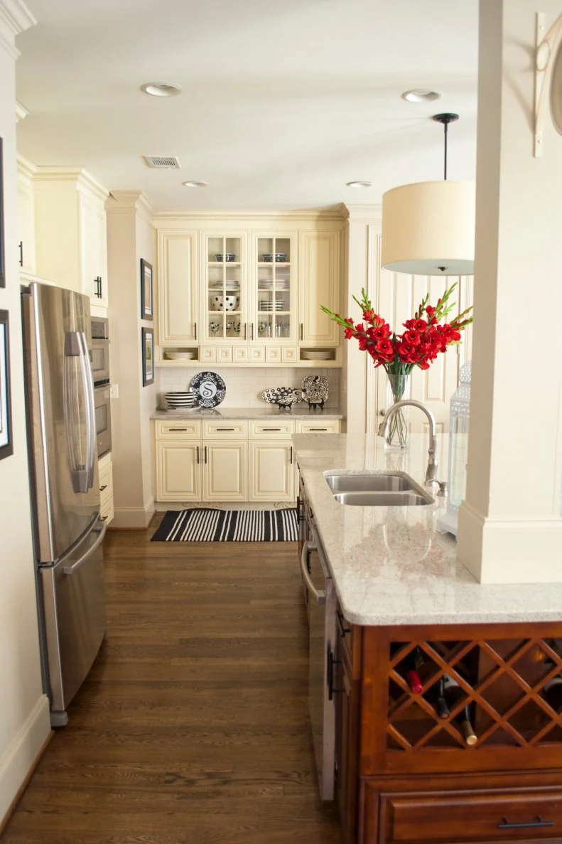 Pretty Traditional Kitchen with Stained and Painted Island and Cabinets
