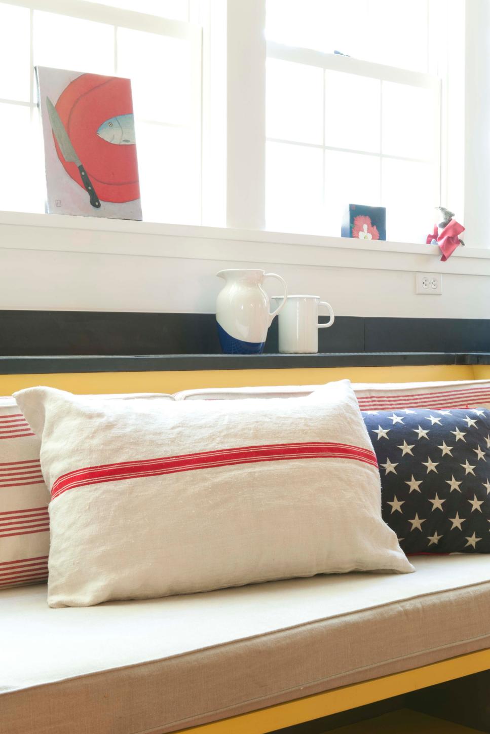 Yellow Kitchen Banquette with Vintage Red, White and Blue Pillows Yellow Kitchen Banquette with Vintage Red, White and Blue Pillows