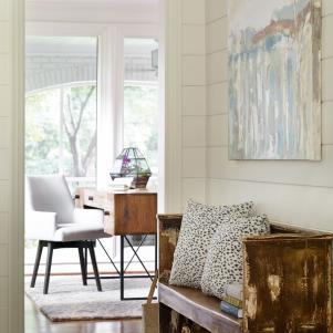 Neutral Hall With Wood Bench and White Wood Plank Walls