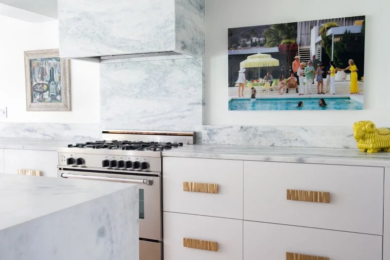 Mid-Century Modern Kitchen with Modern Art and Gold Hardware