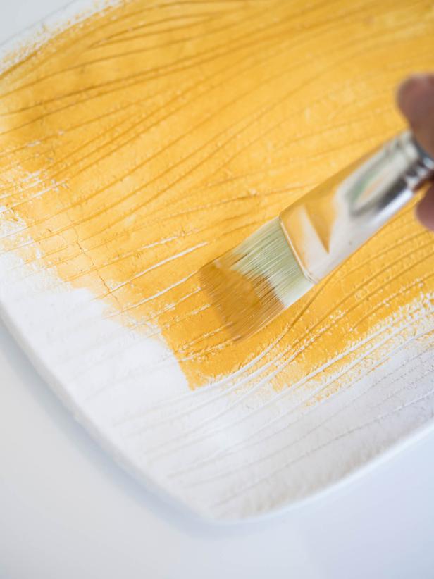 Paint tray in desired color with acrylic craft paints. Once paint is dry, apply a spray-on, non-yellowing glossy clear finish to add shine and protection. Allow finish to dry before use. Tray is for decorative purposes only and is not food safe. Tip: Tray can be left unfinished and/or unpainted, if desired.