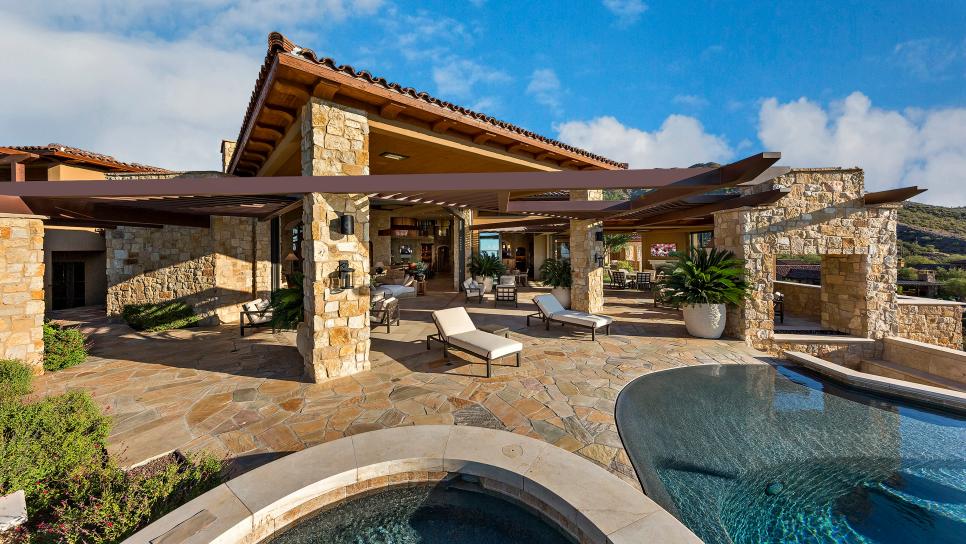 Spacious Flagstone Patio With Infinity Edge Pool Wide Angle View of Contemporary Flagstone Patio and Infinity Pool