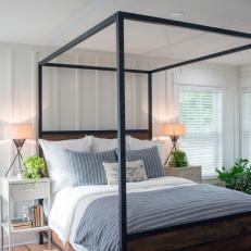 Contemporary Neutral Bedroom with Black Canopy Bed