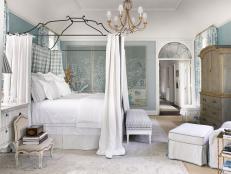 Tranquil Luxury Blue Master Suite with Iron Canopy Bed
