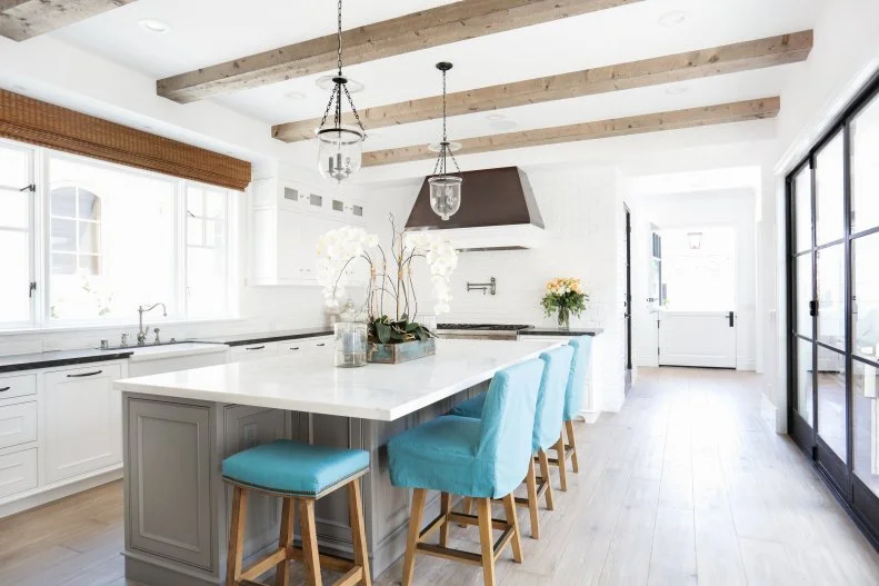 Open Kitchen With Blue Barstools