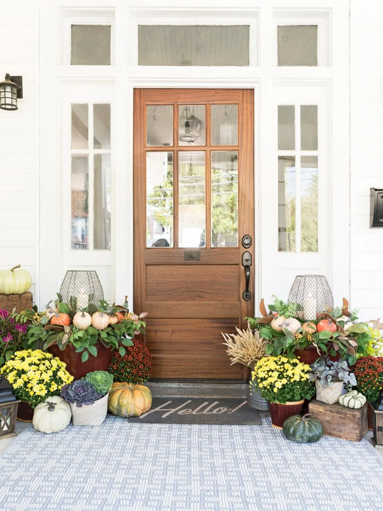 Fall Front Porch With Mums and Candle Lanterns