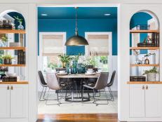 Contemporary Blue Living and Dining Room with White Built-in Shelves 