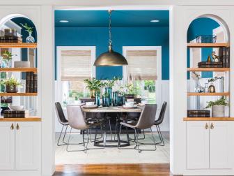 Blue Living and Dining Room with White Built-in Shelves 