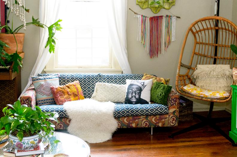 Give your sofa a new look by tossing one of your favorite throws or big pieces of fabric over its body. It's a quick fix with a big impact! Add colorful and textured pillows to complete the look. 