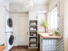 Laundry Room With Wire Baskets and Rug