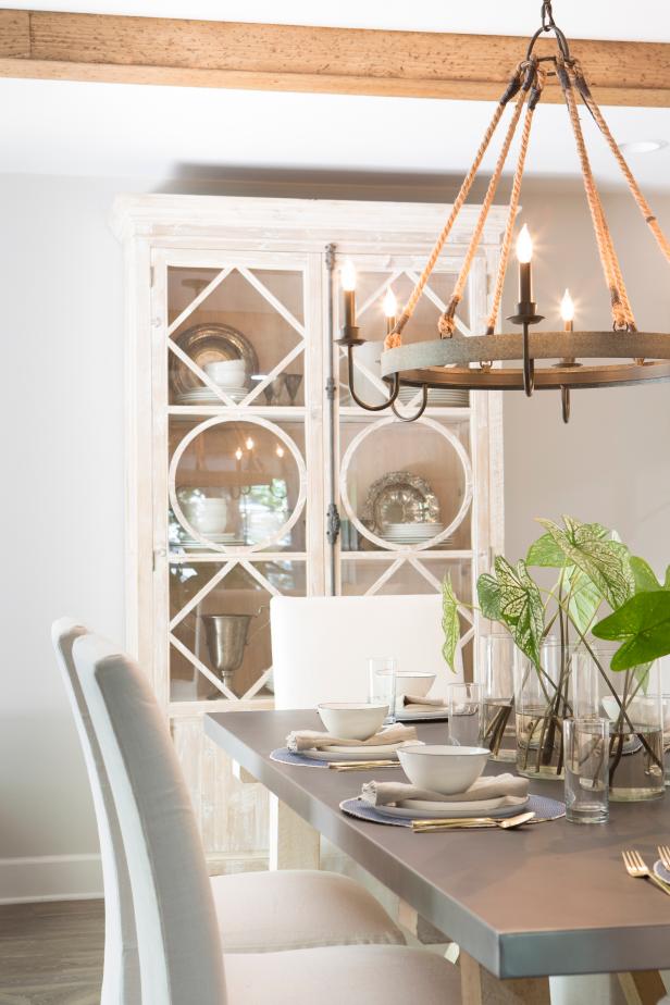 White Dining Room with Wrought-Iron Chandelier 