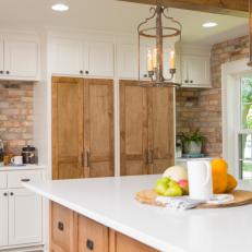 Rustic White Kitchen with Neutral Ceiling-Height Cabinets 