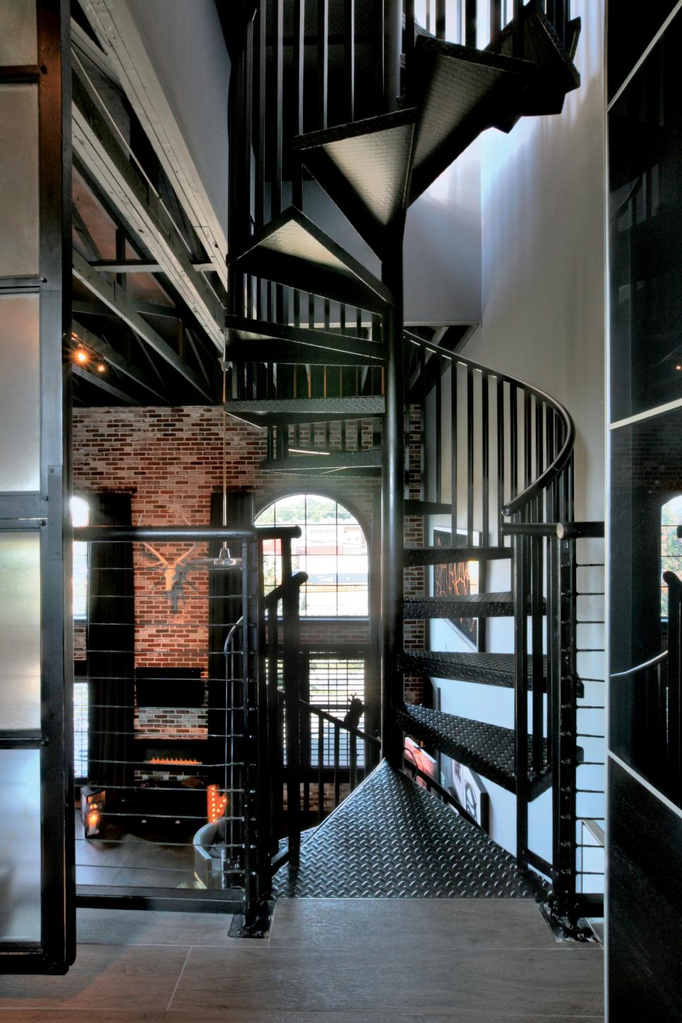 Three-Story Spiral Staircase Saves Room in Townhome Spiral Staircase in Townhome