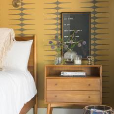 Neutral Midcentury Modern Master Bedroom with Yellow Graphic Wallpaper   