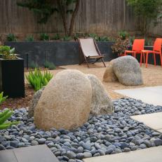Boulder Accents Add Contrast to Whimsical Backyard Design