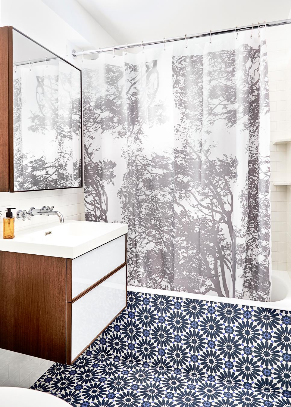 Small Contemporary Bathroom With Bold Patterns White Contemporary Single-Vanity Bathroom With Graphic Tile Floor