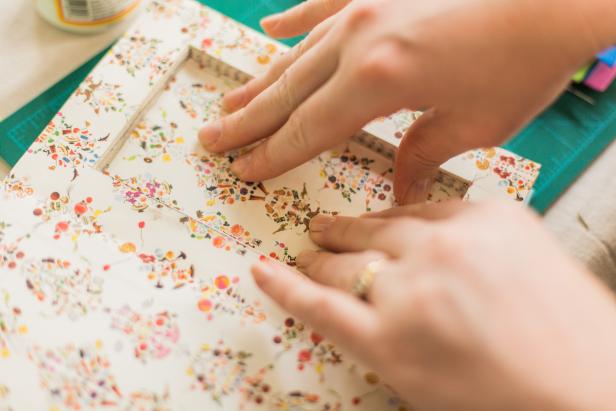 Glue the cutout of the flyleaf you set aside in Step 5 to the bottom layer of pages. This is optional, but if you have a pretty flyleaf, this adds another layer of cuteness and a seamless look. Allow to dry for a couple of hours before using the charger.