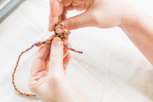 Flip and repeat this process with the other side about 2” away from your first knot (Image A, B & C).