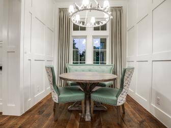 Casual Decor Balances Traditional Wainscoting in Breakfast Nook