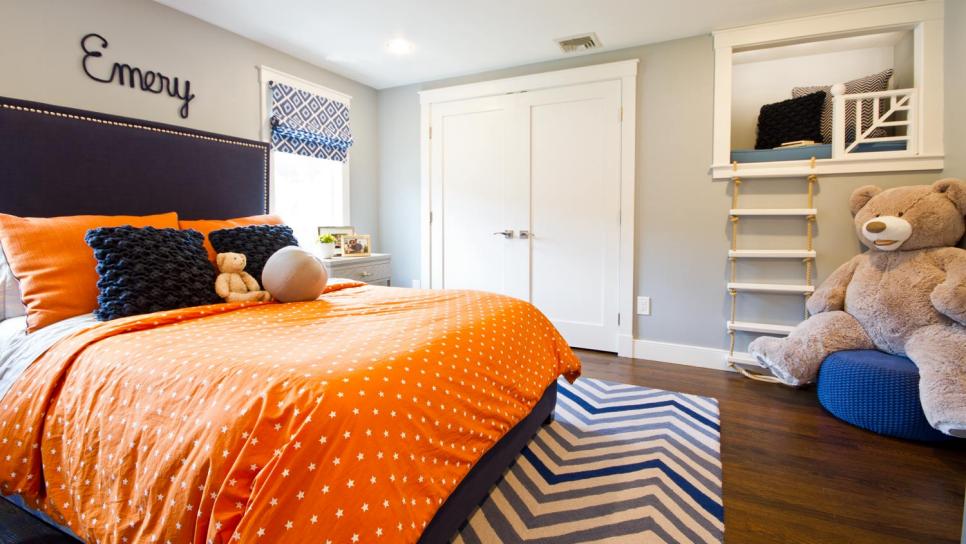 Kid's Bedroom With Orange Bed, Chevron Rug, and Giant Bear Kid's Bedroom With Orange Bed, Chevron Rug, and Giant Bear