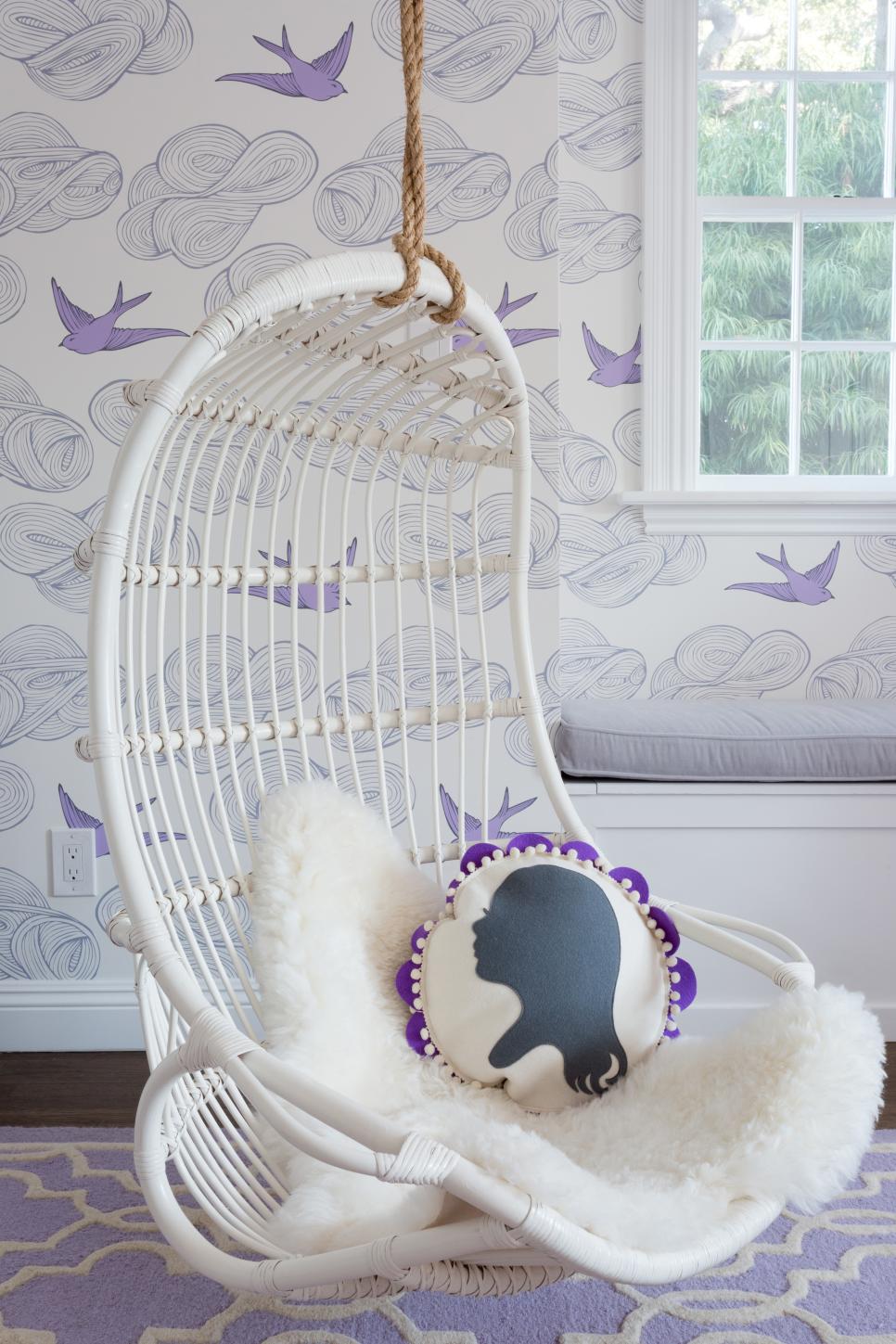 Cozy Reading Space in Playful Girl's Bedroom Eclectic Purple Girl's Bedroom With Hanging Chair