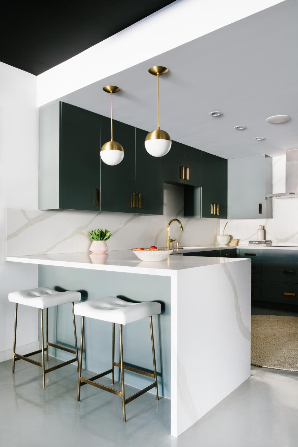Eat-In Bar With Waterfall Countertop in Modern White Kitchen Eat-In Bar With Waterfall Countertop in Modern White Kitchen