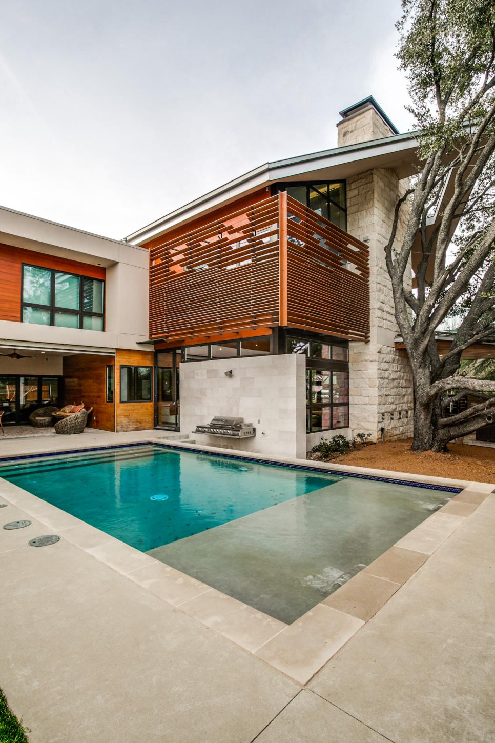 Rectangular Pool With Concrete Deck and Outdoor Grill Rectangular Pool With Concrete Deck and Outdoor Grill