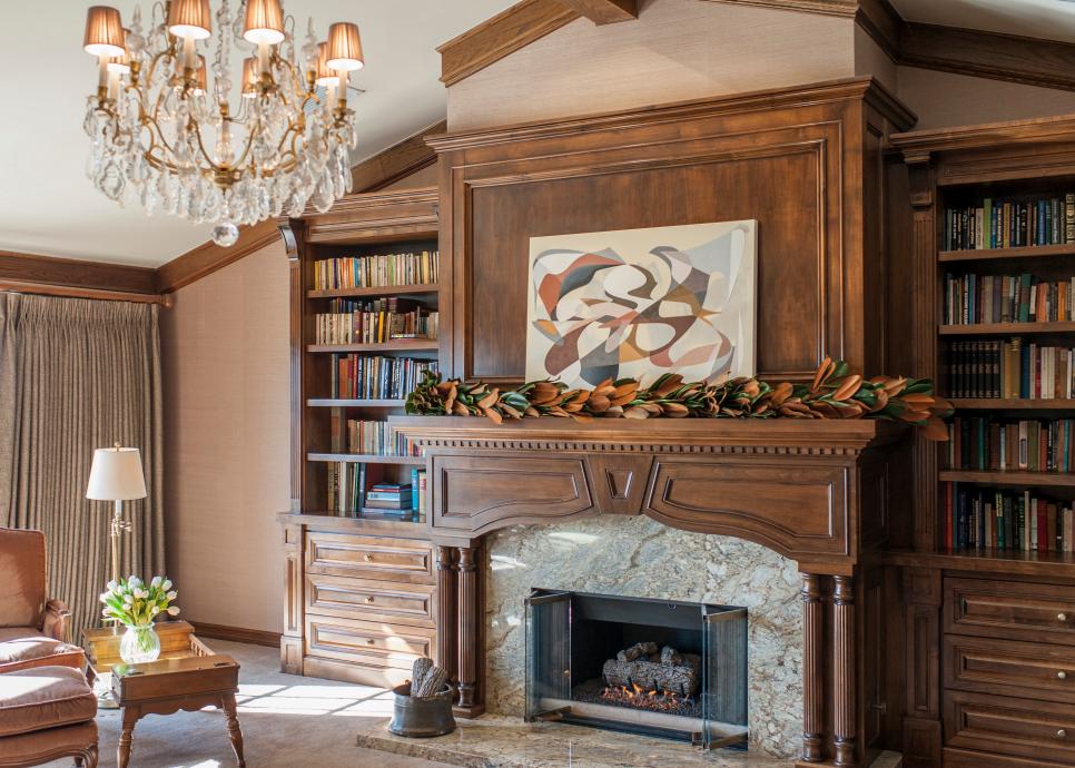 Traditional Wood Fireplace Featuring Built In Bookshelves and Stone Hearth Traditional Living Room Fireplace