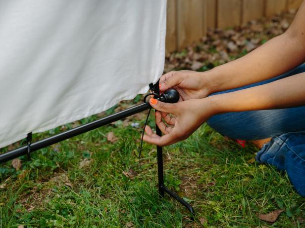 Add zip ties to the corners to secure the screen.