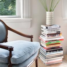 Book Stack and White Vase