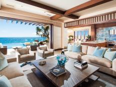 See how architect Chris Light and designer Ohara Davies-Gaetano used an open layout, soaring windows, warm wood finishes and coastal fossils to make this beach house in sunny Dana Point, Calif., feel like a beautiful Balinese villa.