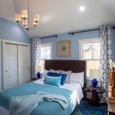 Contemporary Blue Master Bedroom with Brown Headboard