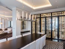 Contemporary Dining Room with Wine Wall