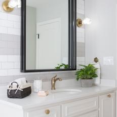 Contemporary White Bathroom with Glass Sconces 