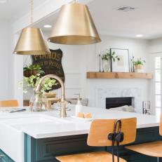 Contemporary White Kitchen with Gold Pendant Lights 