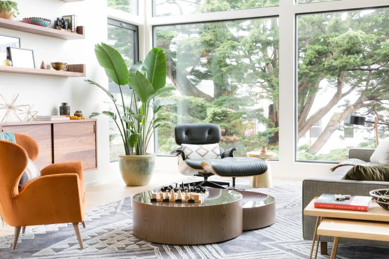 Midcentury Living Room With Orange Armchair