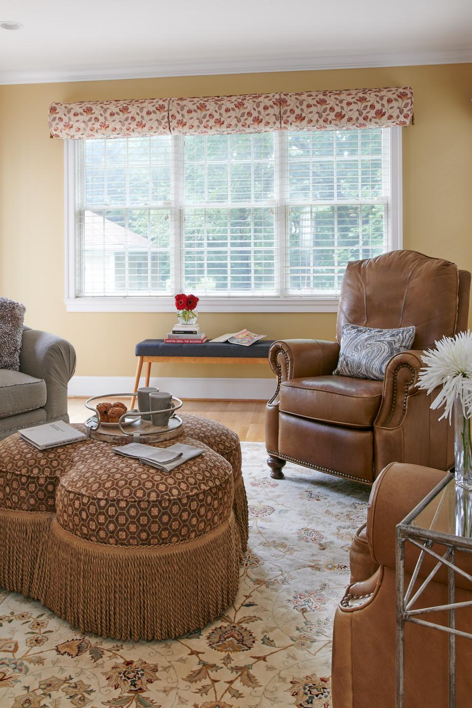 Family Room Sitting Area With Leather Armchairs And Upholstered Ottoman Family Room With Neutral Upholstered Furnishings And Accents