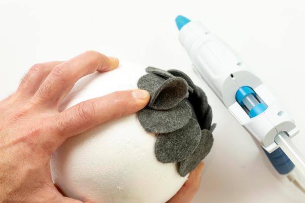 Modern Felt Kissing Ball HGTV shows you how to make your own modern holiday kissing ball from felt.