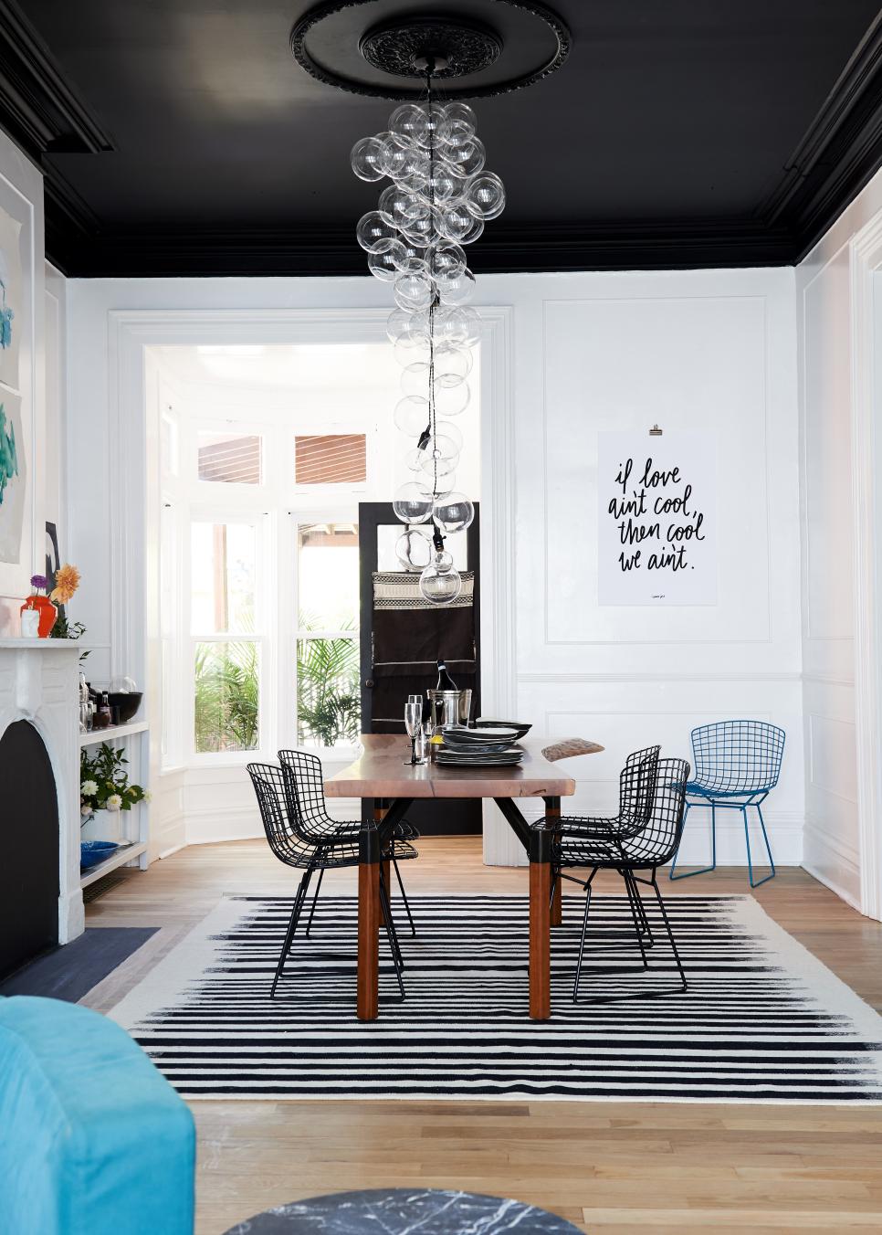 Black and White Contemporary Dining Room With Blue Chair Black and White Contemporary Dining Room