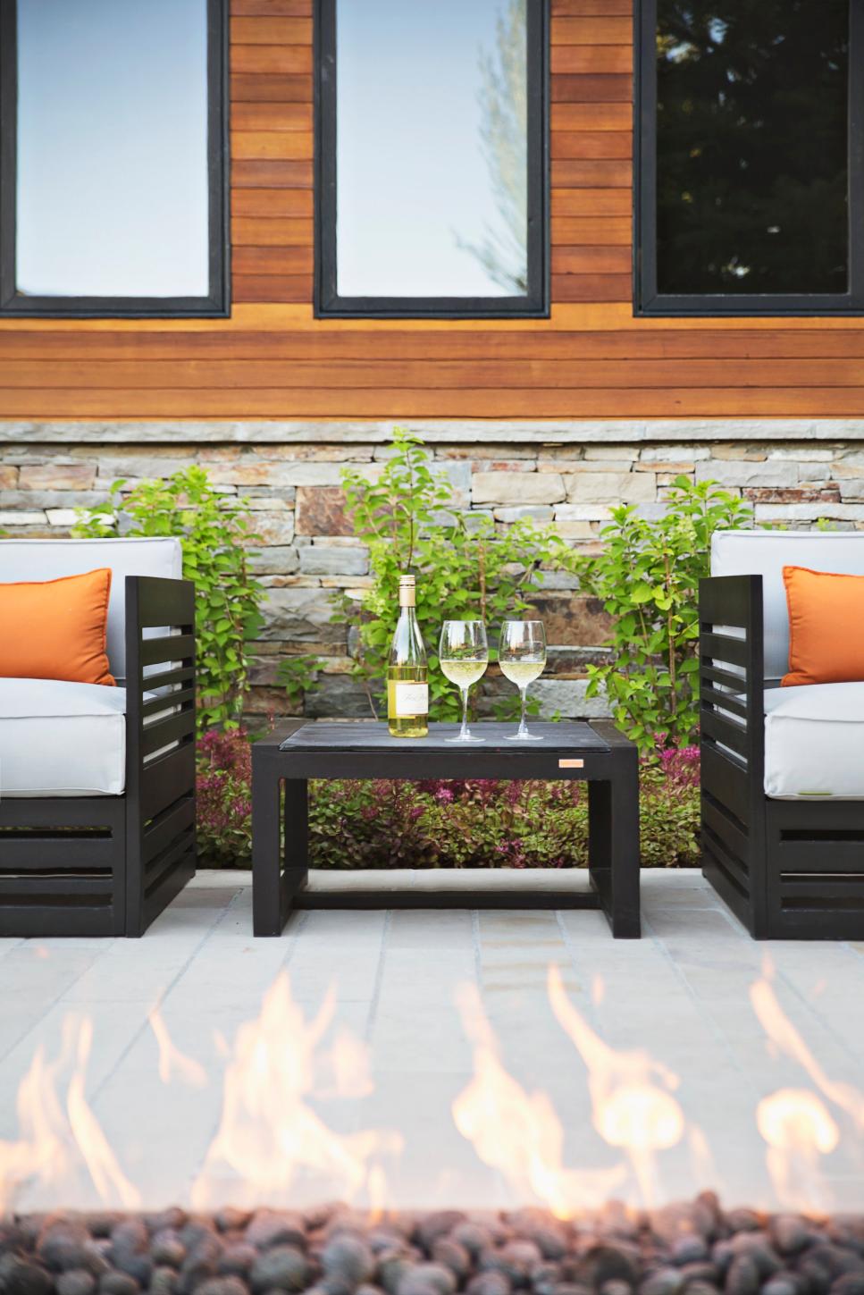 Chic, Glass-Topped Coffee Table outdoor space with contemporary furnishings