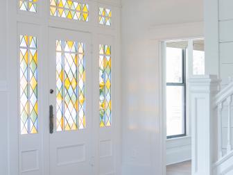 Contemporary White Foyer with Yellow, Green and Blue Stained Glass