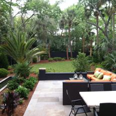 Long Backyard With Orange Sofa