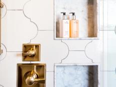 Stylish white tiles and niche create interest in this modern shower.