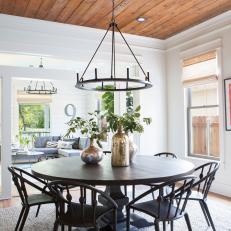 Rustic Black and White Dining Room with Black Chandelier 