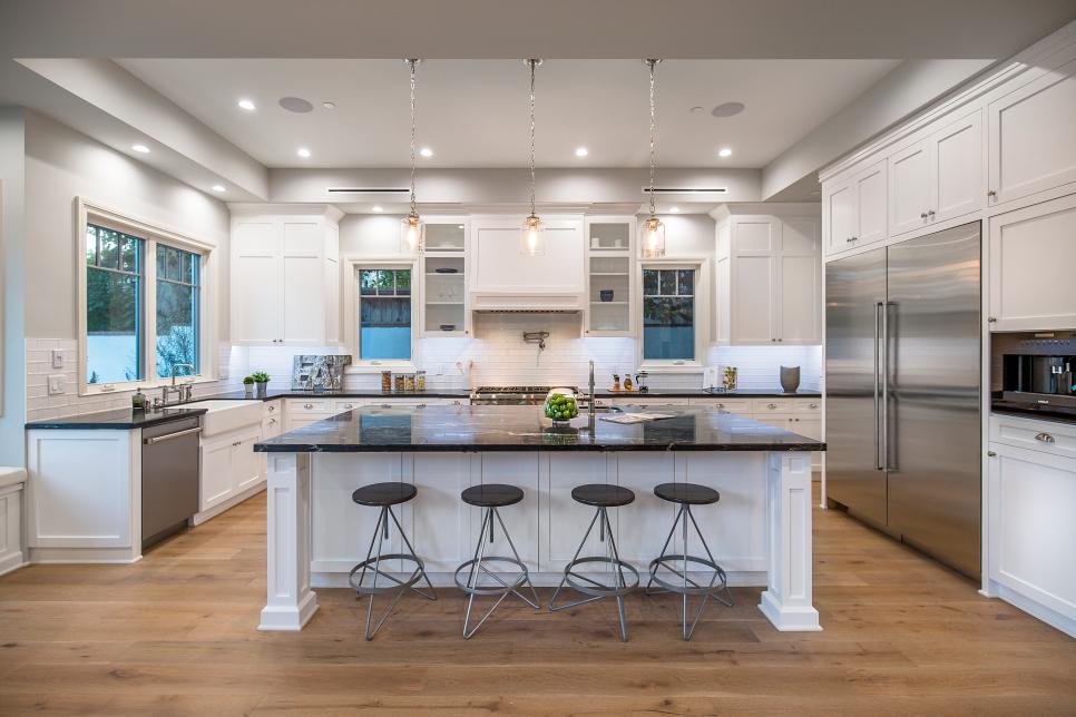 Kitchen Island Doubles as Eat-In Counter transitional kitchen island with black barstools