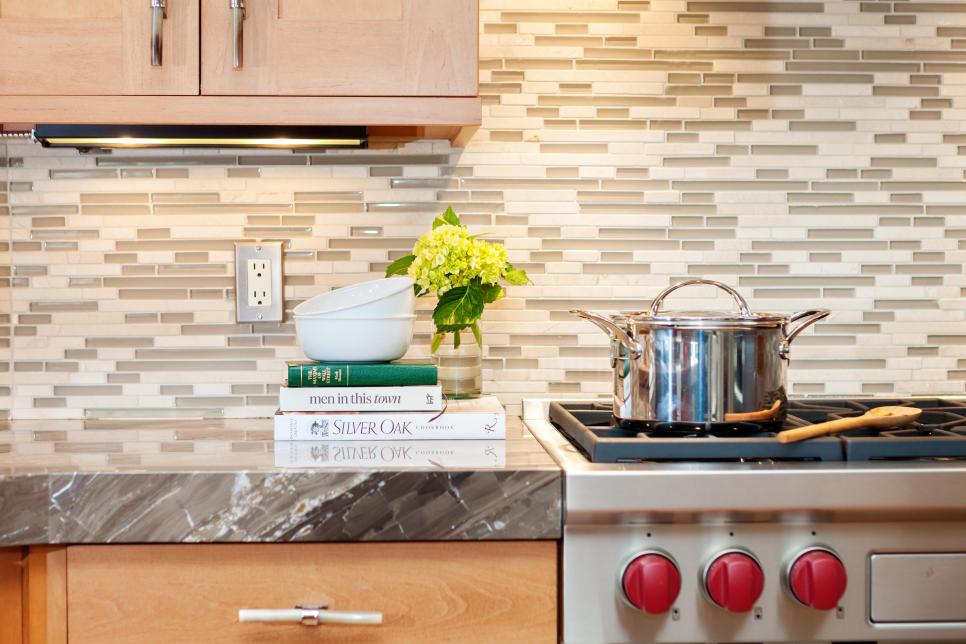 Condo Kitchen in Neutral Tones With Mosaic Backsplash Condo Kitchen in Neutral Tones With Mosaic Backsplash