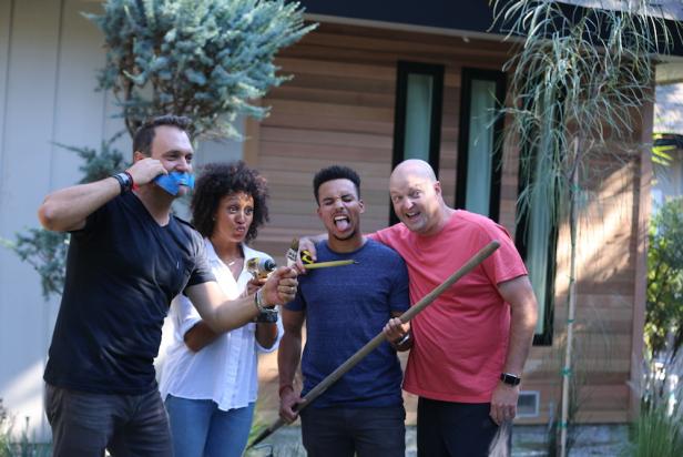 Hosts of The Housleys, Adam Housley (L) and Tamera Mowry - Housley (CL) strike a pose with some tools and their brothers Tavior Mowry (CR) and Arik Housley . (action)
