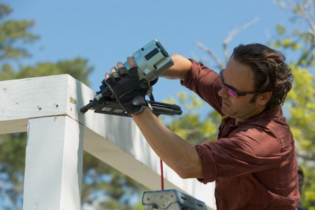 Matt Blashaw Secures Horizontal Beams Matt Blashaw Attaches Horizontal Beams With a Power Nailer