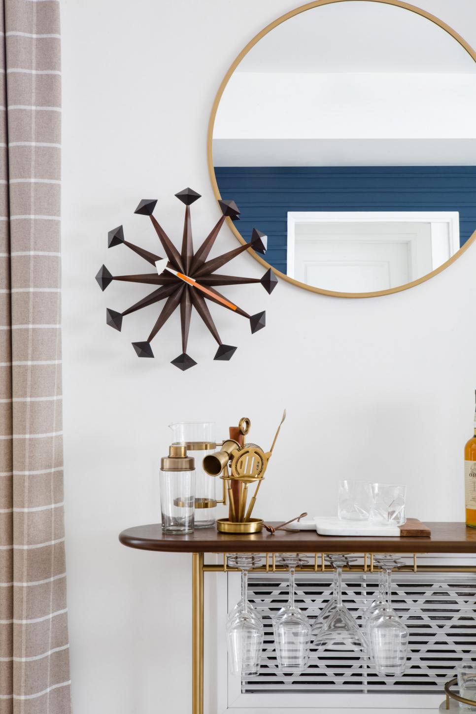 Midcentury-Modern Clock and Round Mirror Mirror and Clock on Wall Above Bar Cart
