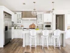 Contemporary Kitchen With White Cabinets And Tile Backsplash